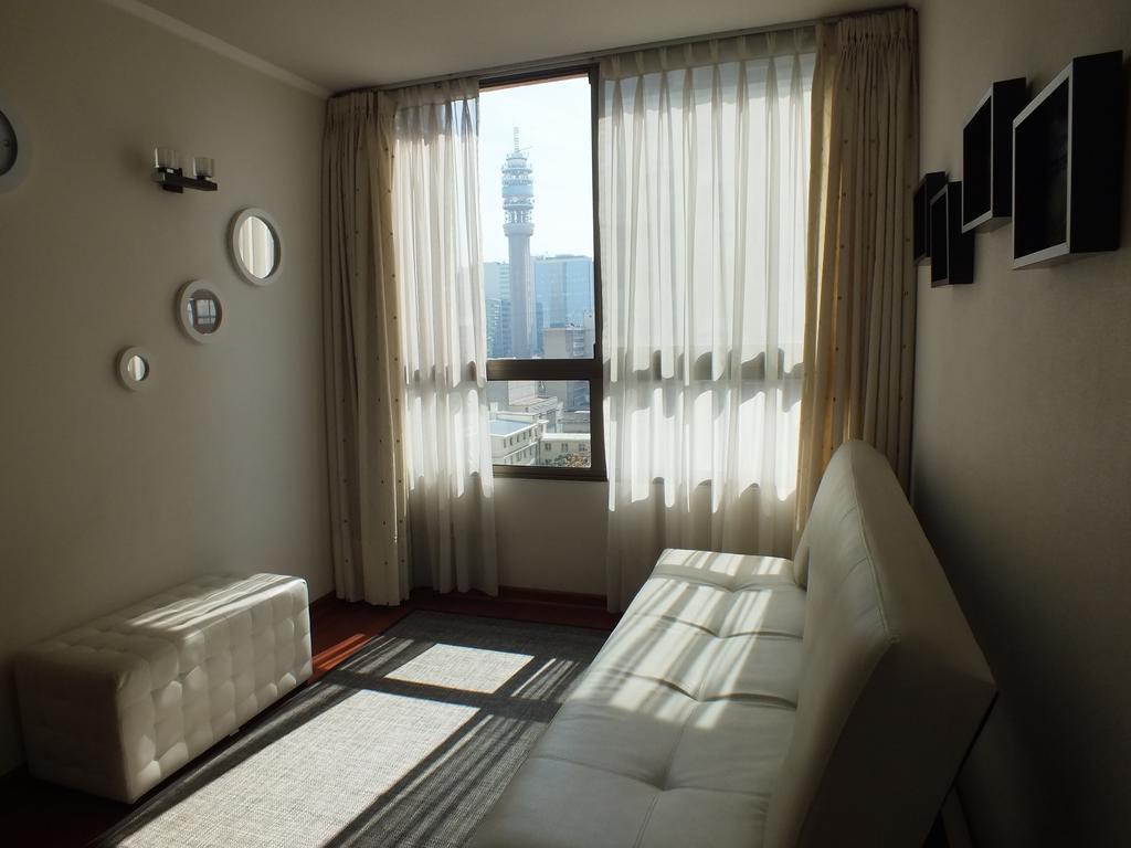 Sys Suites Tarapaca Santiago Quarto foto